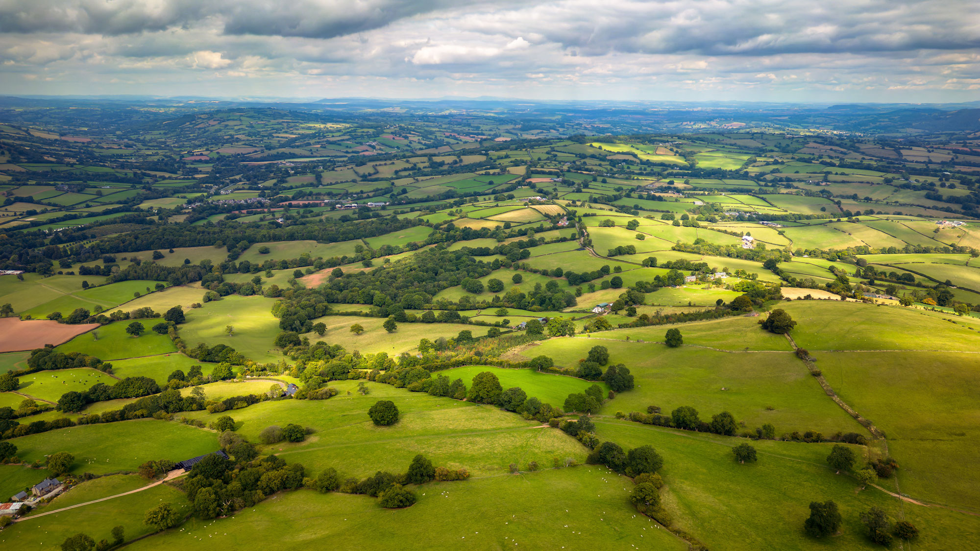 View from summit of Hay Bluff in late afternoon Black Mountains Brecon Beacons Powys South Scenery