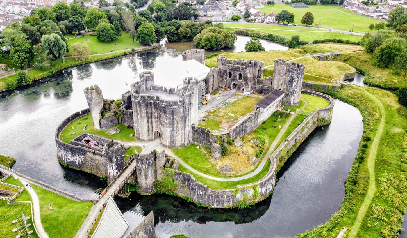 Aerial View of a Historic Caerphilly Castle Surrounded by a Refl