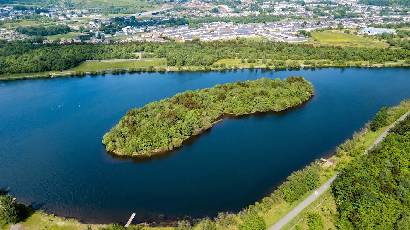 Aerial view of Bryn Bach park and lake in Tredegar, South Wales